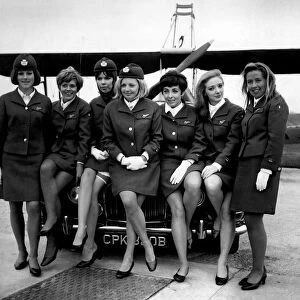 BEA Air Stewardesses line up for a group photograph at Heathrow Airport