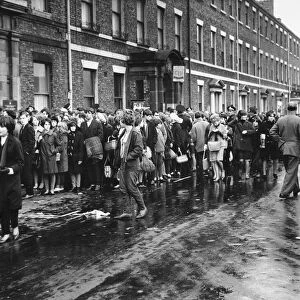 Beatlemania - Its October, 1963, and long lines of Beatles fans queue around