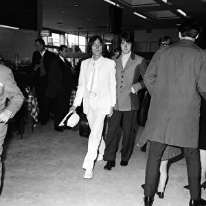 The Beatles 1968 John Lennon and Paul McCartney arriving at Heathrow Airport