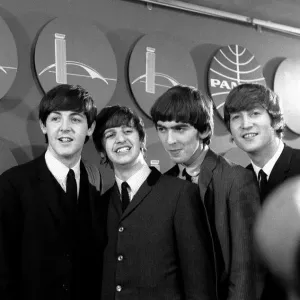 The Beatles answer questions for newsmen and journalists in New York after their arrival