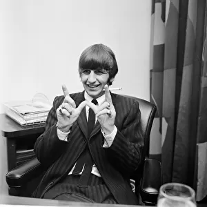 The Beatles drummer Ringo Starr is happy to speak to the press after the birth of his 8oz