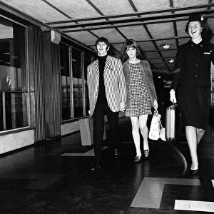 Beatles drummer Ringo Starr and wife Maureen at Heathrow Airport before leaving for a two