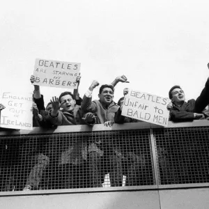 The Beatles February 1964 Protestors and enthusiastic banners greet the Beatles