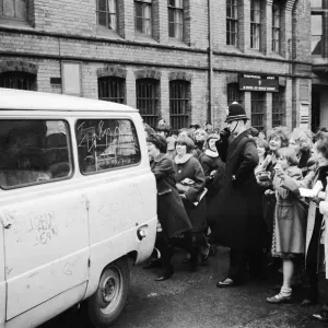 The Beatles leave Birmingham in a van surrounded by hundreds of screaming fans The Beatles leave Birmingham in a van surrounded by hundreds of screaming fans