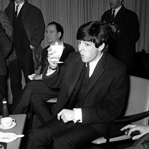 The Beatles leaving for New York. Paul McCartney before boarding the aircraft 7 February
