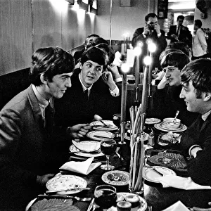 The Beatles, at lunch, London. Left to Right