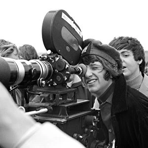 The Beatles May 1965 Ringo Starr behind the camera during the filming of "