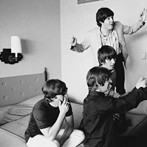 The Beatles with one-armed bandit machine, Sahara Hotel, Las Vegas, 20 August 1964