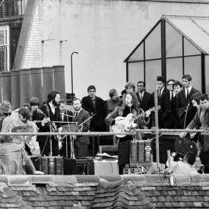 The Beatles Perform on the Apple Headquarters Rooftop Print