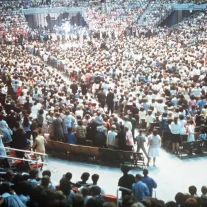 The Beatles play to a packed out Seattle Center during their second tour of the USA