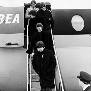 The Beatles pop group John Lennon George Harrison Ringo Starr Paul McCartney descend