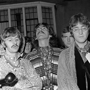The Beatles Ringo Starr, George Harrison and John Lennon talking to the press