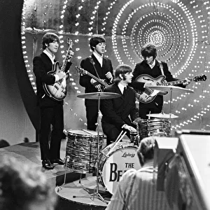 The Beatles on the set of Top Of the Pops, plugging their new single