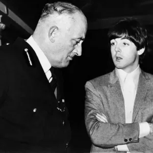 Beatles singer and bass guitarist Paul McCartney talks to Chief Constable of Liverpool Mr Beatles singer and bass guitarist Paul McCartney talks to Chief Constable of Liverpool Mr