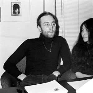 Beatles singer John Lennon with wife Yoko Ono at Apple headquarters as he sends his MBE
