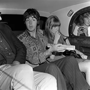 The Beatles singer Paul McCartney in the back of a car at Bangor August 1967