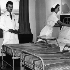 Beds being prepared in bed ward at Geriatrics Unit at Rubery Hill Hospital, Birmingham Beds being prepared in bed ward at Geriatrics Unit at Rubery Hill Hospital, Birmingham