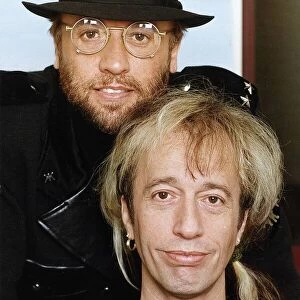 Bee Gees Maurice Gibb top and Robin Gibb bottom
