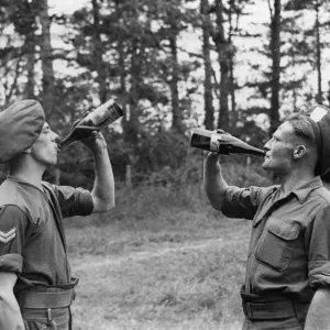 Print of British soldiers enjoying beer in France, July 1944