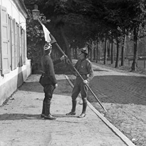 Belgian boy scout with a lance he captured from a German Uhlan soldier he had shot