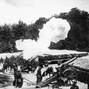A Belgian Fort close to Antwerp replying to the shell fire of German Artillery