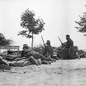 Belgian riflemen lying on the road facing the German advance at Louvain