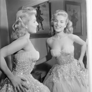 Belinda Lee, British actress tries on dress designed by Julie Harris Belinda Lee, British actress tries on dress designed by Julie Harris
