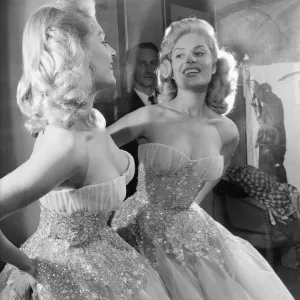 Belinda Lee, British actress tries on dress designed by Julie Harris Belinda Lee, British actress tries on dress designed by Julie Harris