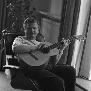 Benny Hill at home in his flat 1969