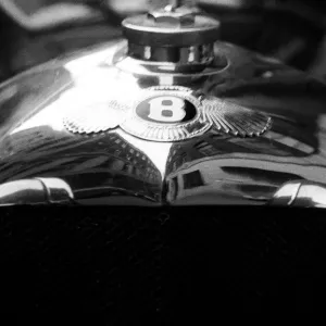 Bentley emblem seen on the bonnet of a 1928 Bentley Speed 6. 26th April 1955 Bentley emblem seen on the bonnet of a 1928 Bentley Speed 6. 26th April 1955