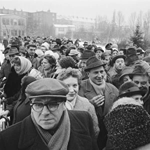 Berliners waiting to cross the wall. December 1963