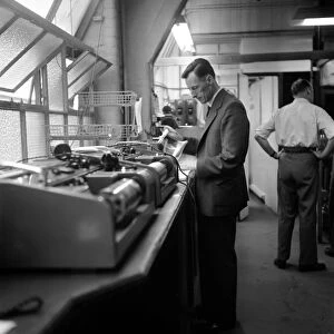 Bernard Coster, Daily Mirror Telephoto Room technician, seen here at work