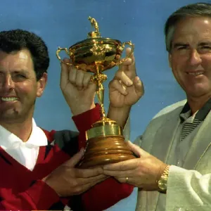 Bernard Gallacher European Ryder Cup Captain holds the trophy with Dave Stockton