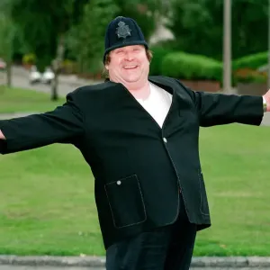 Bernard Manning dressed in a Policemans Uniform, 11th August 1992 Bernard Manning dressed in a Policemans Uniform, 11th August 1992