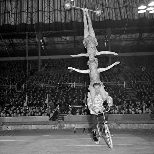 Bertram Mills Circus Acts Dec 1952 Two woman ballance on the shoulders of man
