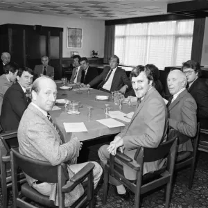 A print of a group photograph featuring prominent football managers