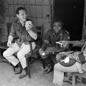 A Biafran officer seen here with Daily Herald staff photographer Ron Burton (left A Biafran officer seen here with Daily Herald staff photographer Ron Burton (left