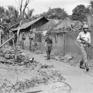 Biafran soldiers seen here entering a recently captured village from the Nigerian army Biafran soldiers seen here entering a recently captured village from the Nigerian army