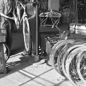 Bicycles being assembled on the production line at the Bianchi factory in Milan Bicycles being assembled on the production line at the Bianchi factory in Milan