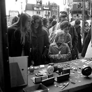Last of the big spenders at Petticoat Lane. The moment of decision for 8-year-old Deborah