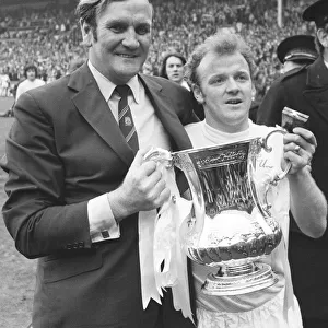 Billy Bremner Leeds United captain with manager Don Revie holding the F. A