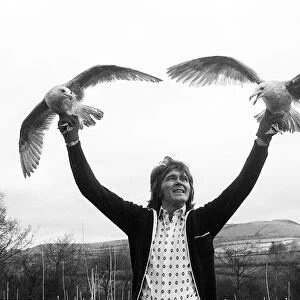 Billy Fury Feb 1977 ex pop star on the farm with two gulls