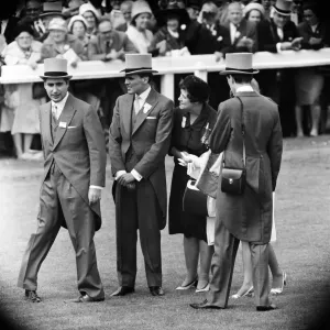 Billy Fury (second from left), on Derby Day at the Epsom Races. 3rd June 1964