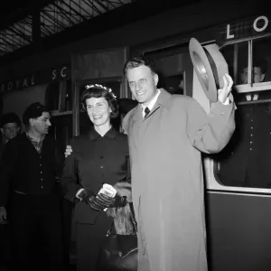Billy Graham, the evangelist, arrived in London tonight with his wife Ruth after his Billy Graham, the evangelist, arrived in London tonight with his wife Ruth after his