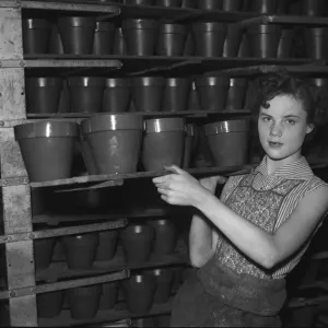 Bilston Pottery 1958 Glazed flower pots being readied for the final firing Bilston Pottery 1958 Glazed flower pots being readied for the final firing