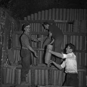 Bilston Pottery 1958 Print: Loading flower pots into the kiln