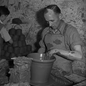 Bilston Pottery 5th May 1958 A potter seen here throwing a large flower pot Bilston Pottery 5th May 1958 A potter seen here throwing a large flower pot