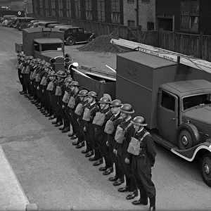 Birmingham A. R. P. Rescue drivers and attendants in their new uniforms at the Central Car