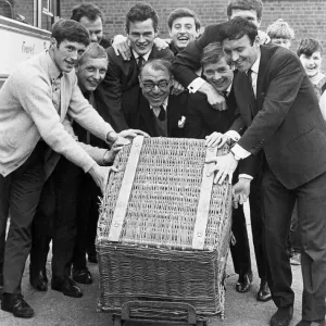 Birmingham City club coach driver Mr Dennis Peters is helped by players to load Birmingham City club coach driver Mr Dennis Peters is helped by players to load
