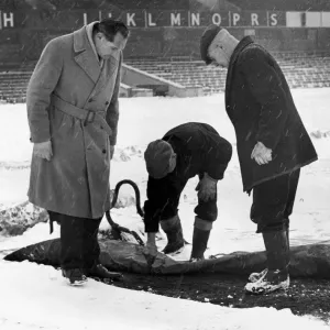 Birmingham City manager Gil Merrick (left) takes a close look at the St Andrews pitch as Birmingham City manager Gil Merrick (left) takes a close look at the St Andrews pitch as